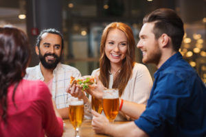 Diners at a restaurant pub table