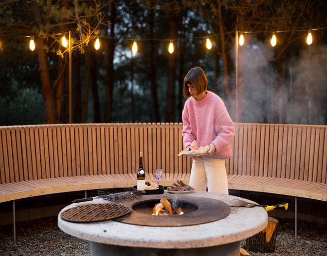 A picture showing outdoor patio with Firepit