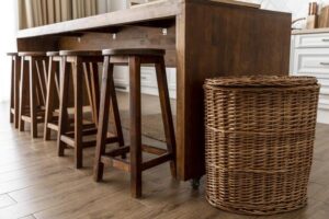 Picture of counter stool and bar stool arranged near kitchen table