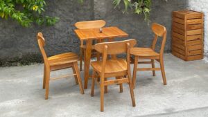 Durable wood chairs and table outside