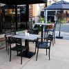 Vanguard Outdoor Table Tops - Geo Concrete = Shown on Restaurant Patio
