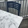 Vanguard Outdoor Table Tops - White Marble - Closeup with Chair