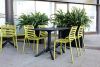Doga Resin Outdoor Side Chairs at Black Tables