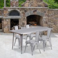 Silver 31.5" x 63" rectangular metal table with 4 stack chairs