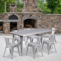 Silver 31.5" x 63" rectangular metal table with 6 arm chairs
