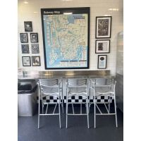 319 Aluminum Barstool - group of 3 in restaurant
