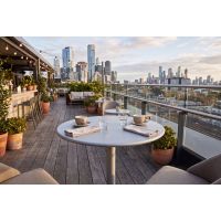Spun metal table tops on outdoor deck